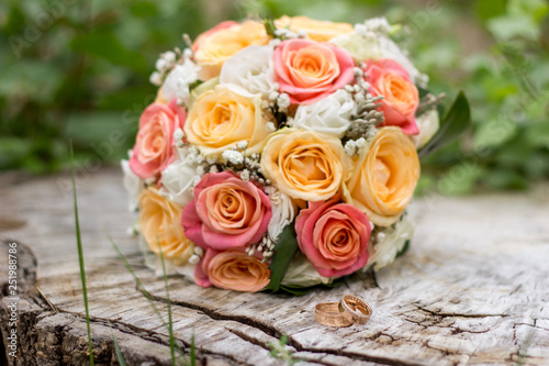 beautiful wedding bridal bouquet and wedding rings