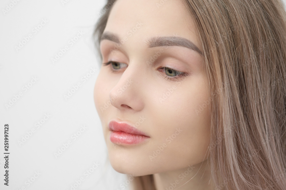Close-up of the face of a beautiful young blonde girl with smooth skin. Close-up of the face of a beautiful young blonde girl with smooth skin.