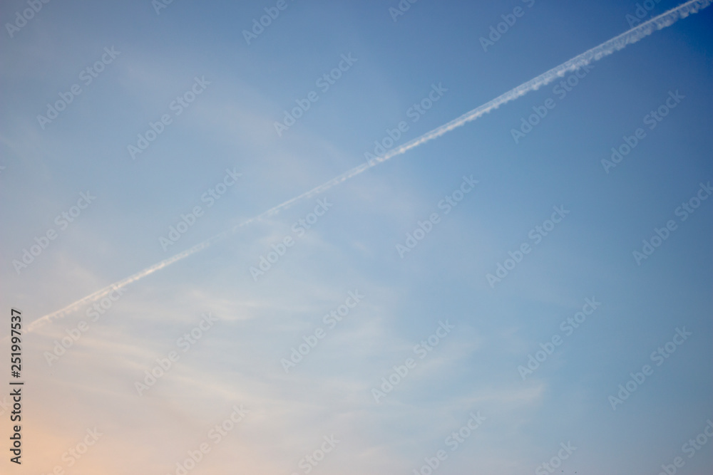 Trail after the plane in the sky. Trail after the plane in the sky.