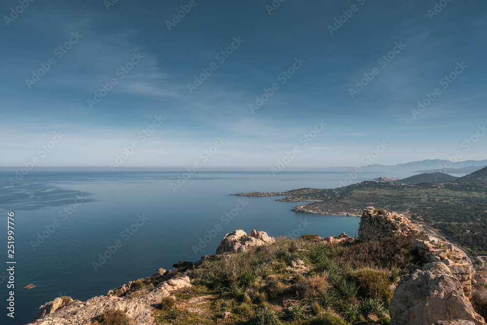 Coast of Corsica viewed from rocky mountain outcrop