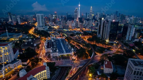 Wallpaper Mural 4K Cinematic Zooming Out From Train Station Time Lapse Footage of Kuala Lumpur city skyline taken from TNB 2 Building near KL Sentral. Torontodigital.ca