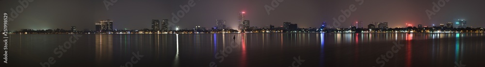 Fototapeta premium Hanoi skyline night panorama from West Lake.