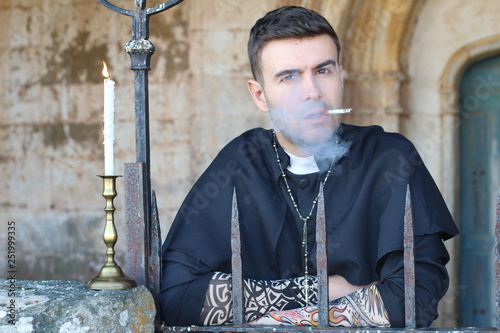 Foto Sexy priest with a rebel attitude