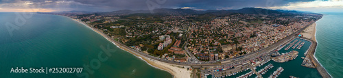 Aerial panoramic photo of Montgat and sea port Masnou at sunset, east of Barcelona, Spain photo