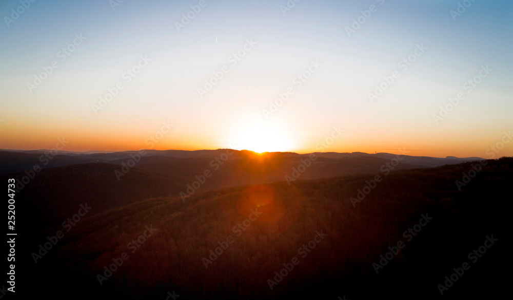 aerial drone flight, direction Vienna over the Vienna Woods at sunrise, Königstetten, lower Austria, Wienerwald