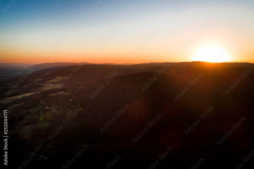 aerial drone flight, direction Vienna over the Vienna Woods at sunrise, Königstetten, lower Austria, Wienerwald aerial drone flight, direction Vienna over the Vienna Woods at sunrise, Königstetten, lower Austria, Wienerwald