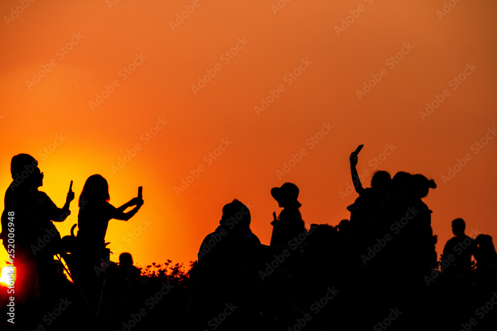 silhouettes of people taking pictures with smartphone silhouettes of people taking pictures with smartphone