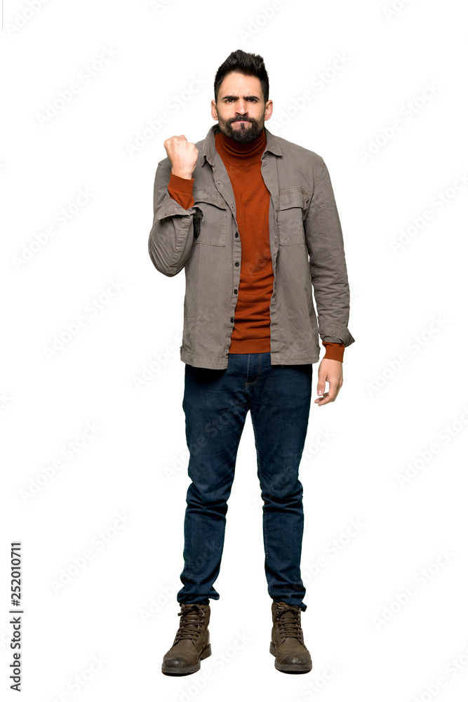 Full-length shot of Handsome man with beard with angry gesture on isolated white background Full-length shot of Handsome man with beard with angry gesture on isolated white background