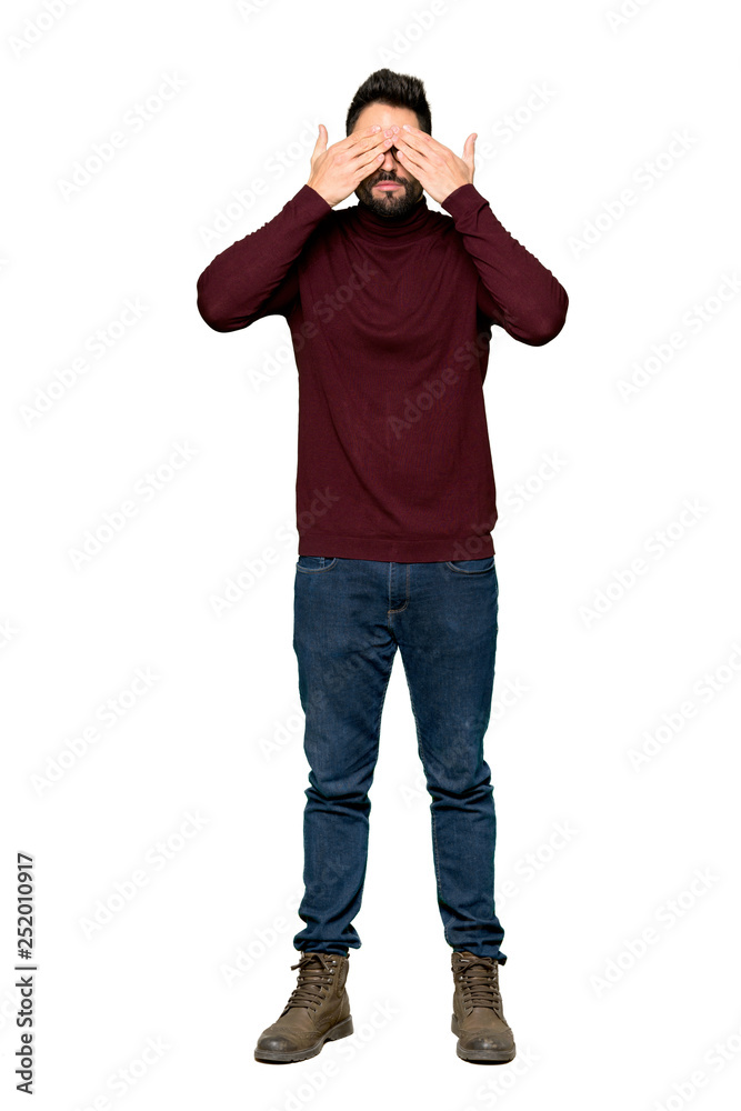 Full-length shot of Handsome man with glasses covering eyes by hands. Surprised to see what is ahead on isolated white background Full-length shot of Handsome man with glasses covering eyes by hands. Surprised to see what is ahead on isolated white background