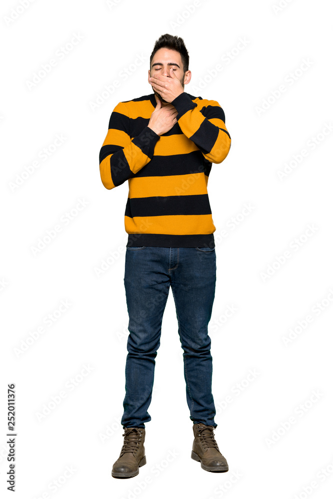 Full-length shot of Handsome man with striped sweater is suffering with cough and feeling bad on isolated white background Full-length shot of Handsome man with striped sweater is suffering with cough and feeling bad on isolated white background
