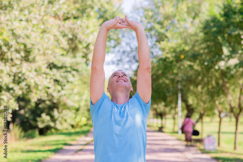 Mature man exercise in a city park Mature man exercise in a city park