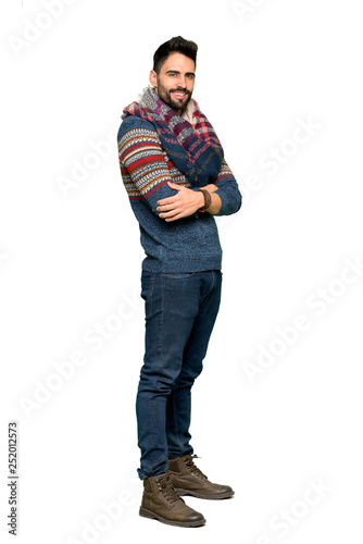 Full-length shot of Hippie man with arms crossed and looking forward on isolated white background