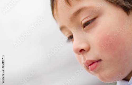 portrait of sad little boy kid expression face look lip model eyes face person human cute skin beatiful 