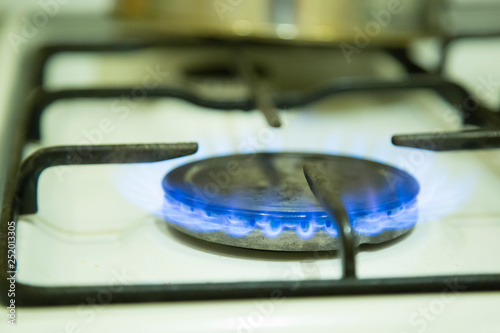 blue flames of gas stove