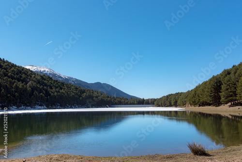 In Winter the Frozen Lake of Engolasters, Encamp, Andorra.
