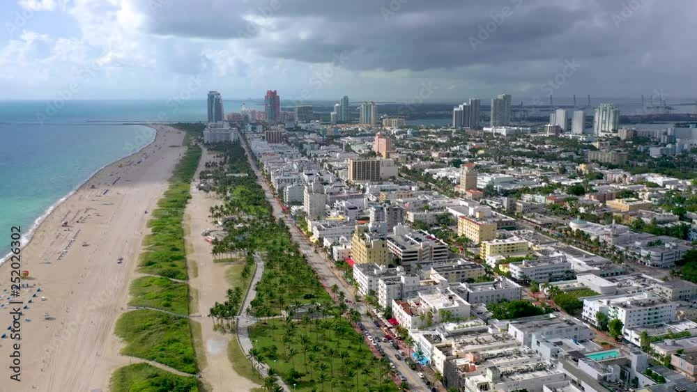 MIAMI, FLORIDA, USA - JANUARY 2019: Aerial drone panorama view flight over South Miami beach ocean coastline. MIAMI, FLORIDA, USA - JANUARY 2019: Aerial drone panorama view flight over South Miami beach ocean coastline.