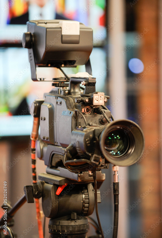 Fototapeta premium TV camera behind the scenes of video production or video shooting at studio