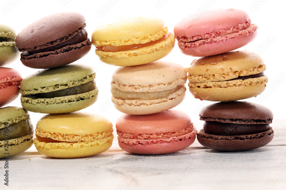 Sweet and colourful french macaroons or macaron on white background Sweet and colourful french macaroons or macaron on white background