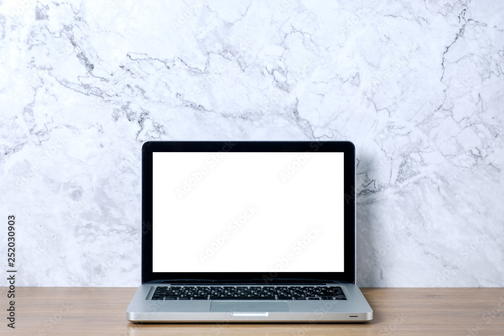 Fototapeta premium Mock up laptop.Laptop computer on student minimal workspace and marble wall.
