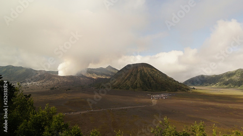 Obraz na płótnie Steam clouds coming out from Mount Bromo, an active volcano in the Bromo Tengger Semeru National Park in East Java, Indonesia. w salonie