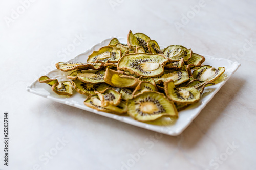 Dried Kiwi Slices with Plate / Organic Dry Fruit.