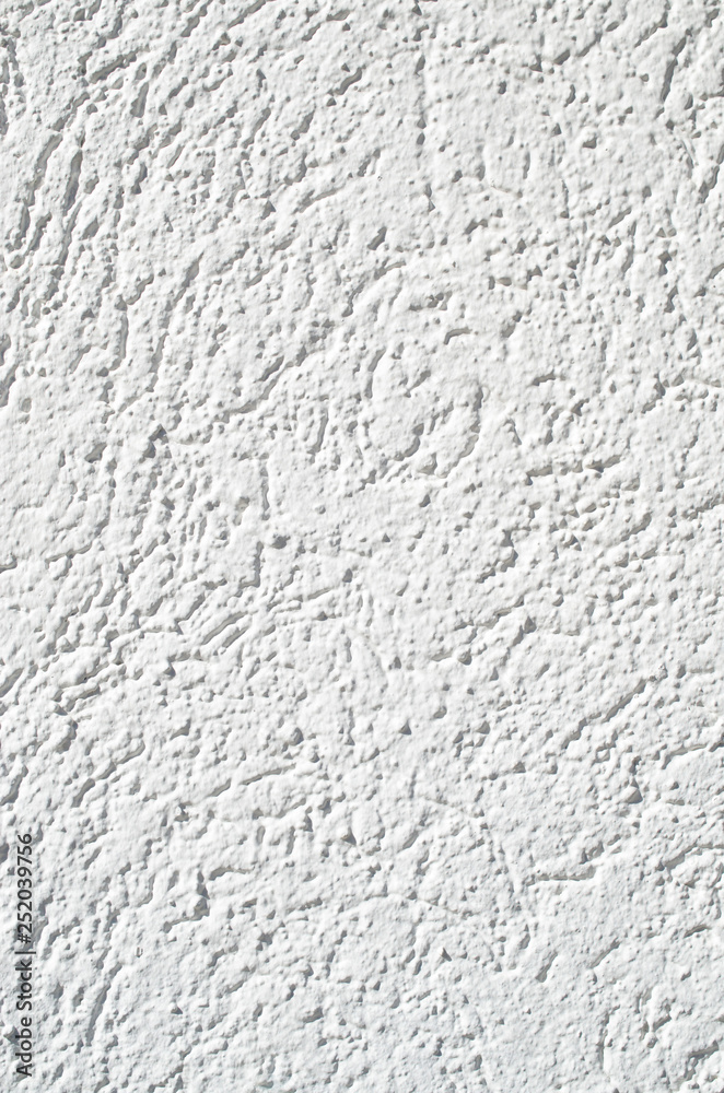 Fototapeta premium New white plaster on wall closeup