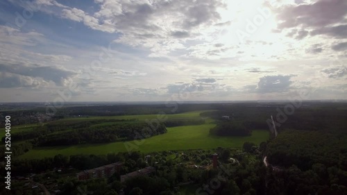 Wallpaper Mural Aerial shot of picturesque green rural landscape. Township among vast meadows and woods. Domodedovo, Russia Torontodigital.ca