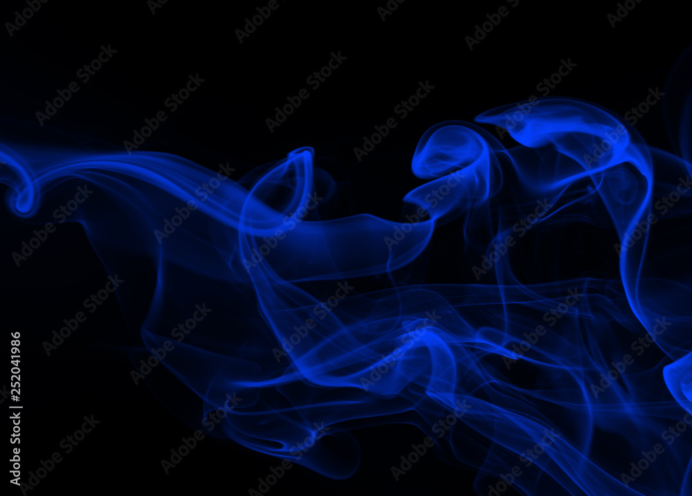 Blue smoke abstract on black background, darkness concept