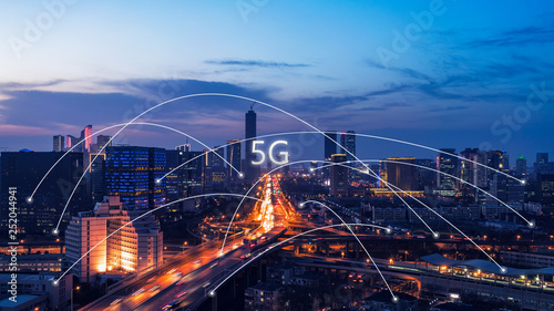 5G network wireless systems and internet of things with modern city skyline