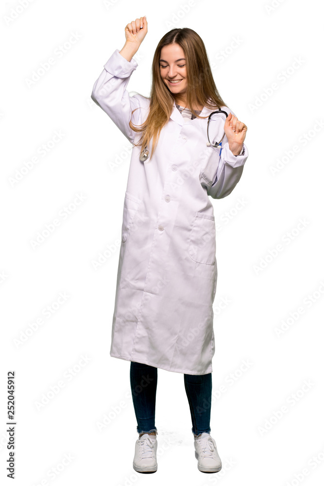 Full body Young doctor woman celebrating a victory on isolated background Full body Young doctor woman celebrating a victory on isolated background