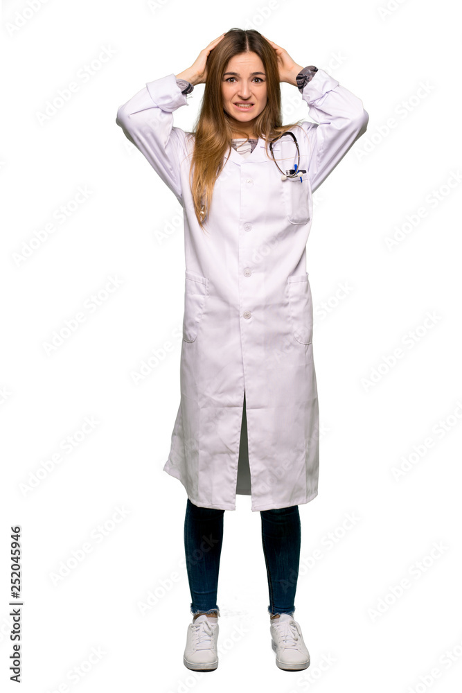Full body Young doctor woman takes hands on head because has migraine on isolated background Full body Young doctor woman takes hands on head because has migraine on isolated background