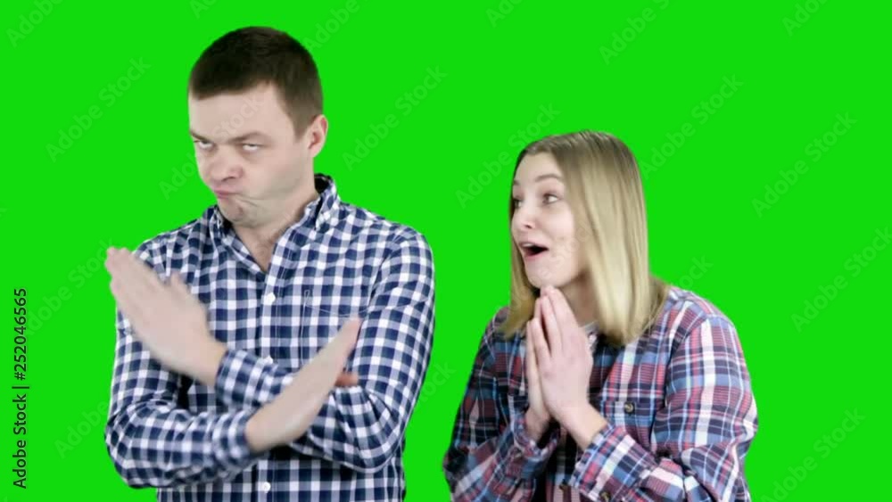 Young woman asking her husband about something Young woman asking her husband about something