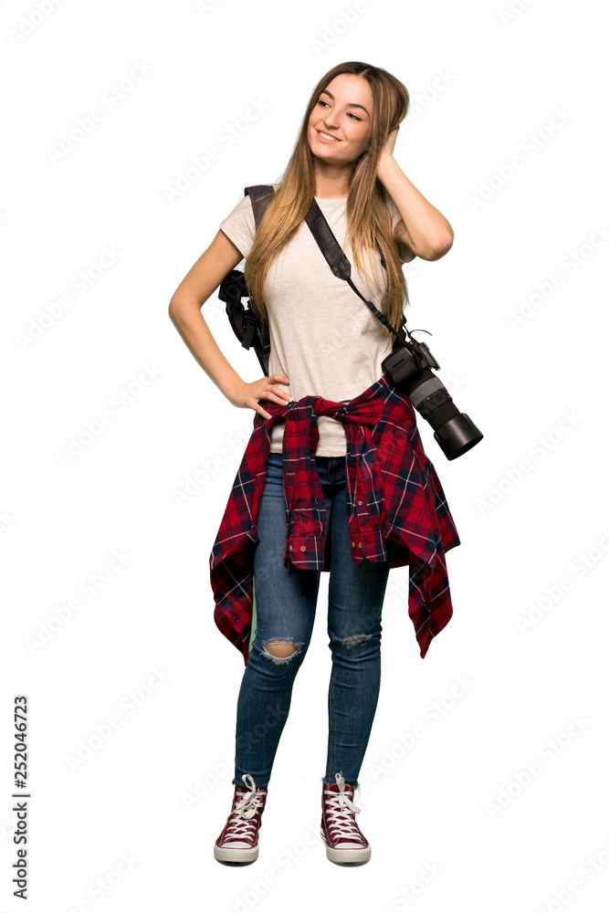 Full body Young photographer woman thinking an idea while scratching head on isolated background Full body Young photographer woman thinking an idea while scratching head on isolated background