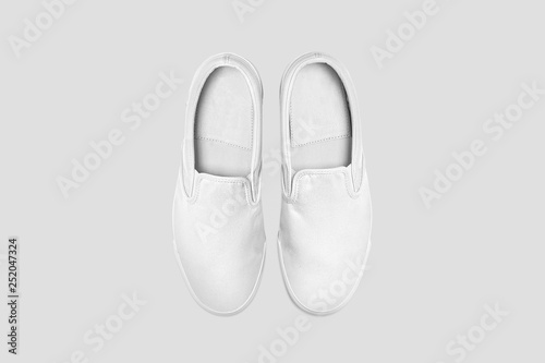 Blank white slip-on Shoes Mock up set, isolated. Plain hipster slip-on Mock up template. Urban skate shoes with clear label presentation.High resolution photo.Top view.