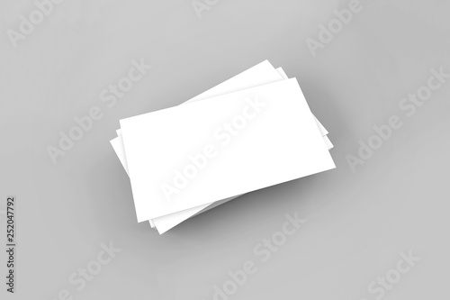 Mock up of stack of blank name business cards on soft gray background. 3D rendering