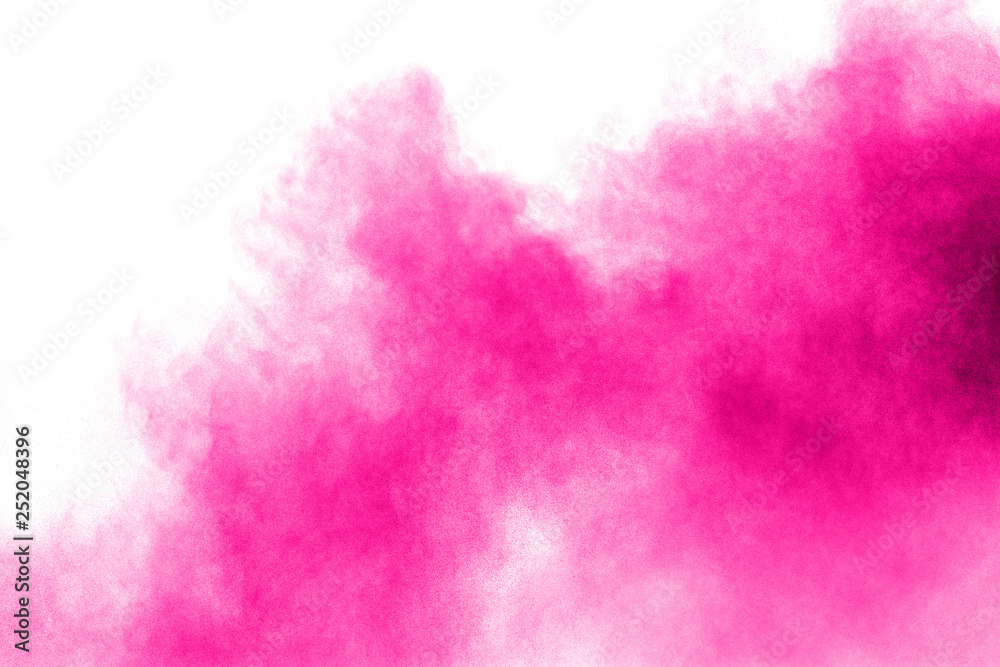 Pink powder explosion on white background.Pink dust splashing.  Launched colorful particles on background.