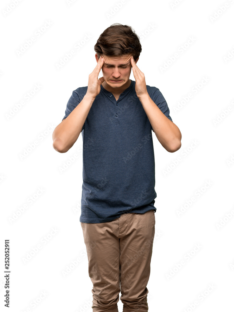 Teenager man with headache over isolated white background Teenager man with headache over isolated white background
