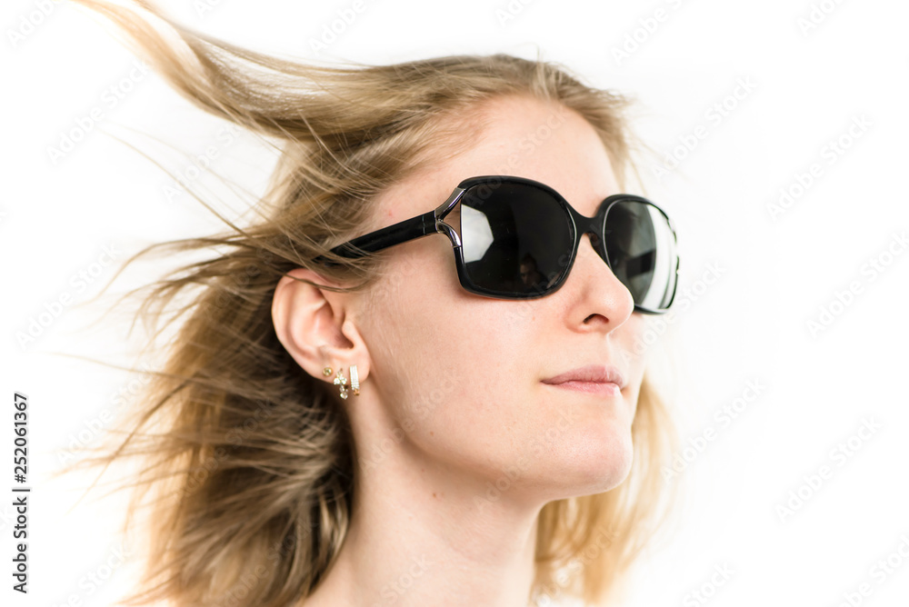 face of a pretty girl blonde in sunglasses close-up on a white background face of a pretty girl blonde in sunglasses close-up on a white background
