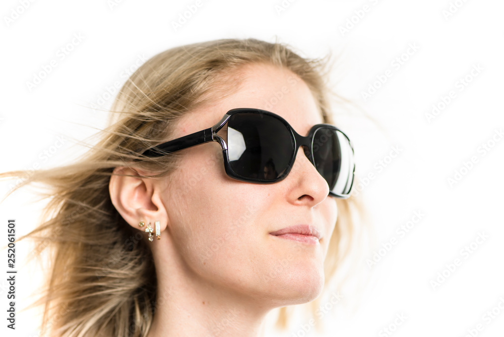 face of a pretty girl blonde in sunglasses close-up on a white background face of a pretty girl blonde in sunglasses close-up on a white background