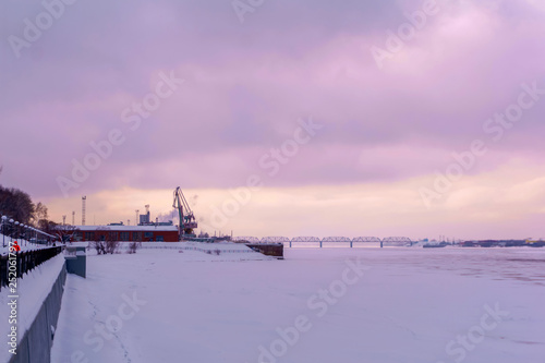 frozen river, cargo port and quay © Evgeny