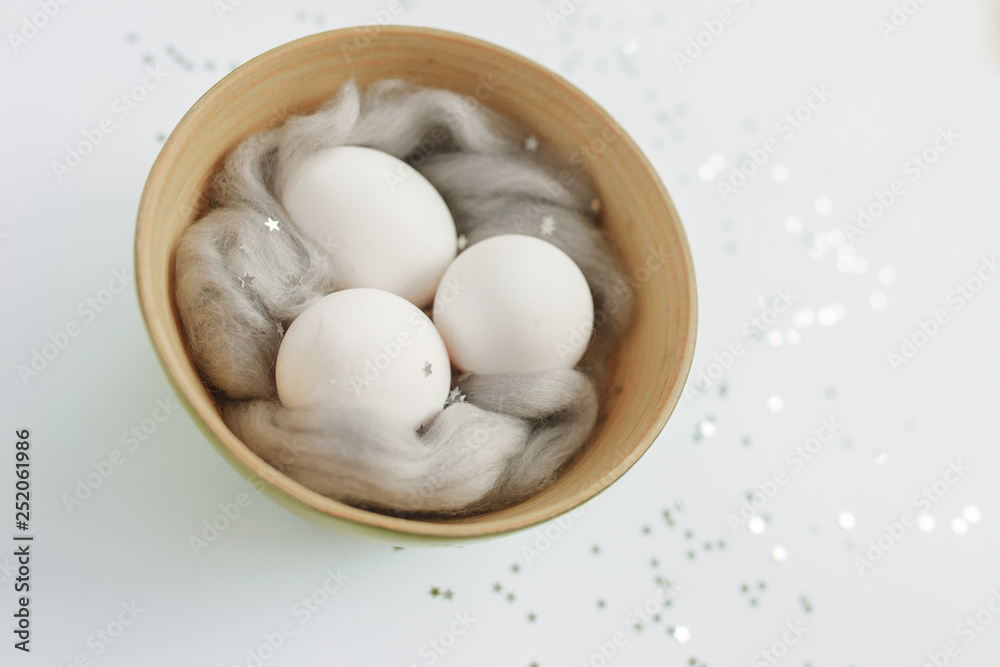 Easter. Easter eggs. Bokeh. Silver. Bowl with eggs Easter. Easter eggs. Bokeh. Silver. Bowl with eggs