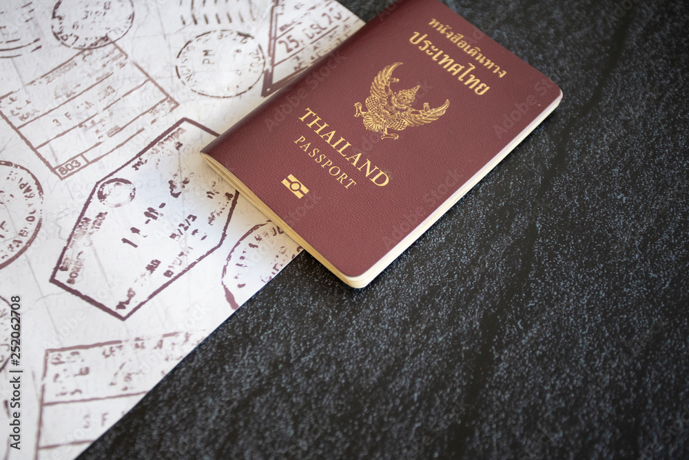 Thailand passport Put on the table planning her next trip around the world,booking travel with digital technology app via laptop, search website service hotel Happy Holiday Trip Thailand passport Put on the table planning her next trip around the world,booking travel with digital technology app via laptop, search website service hotel Happy Holiday Trip