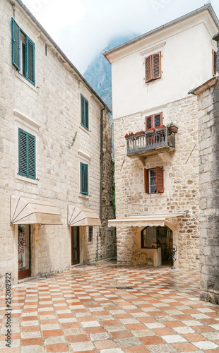 Old european city street view with colorful buildings In Montenegro Budva © Artem