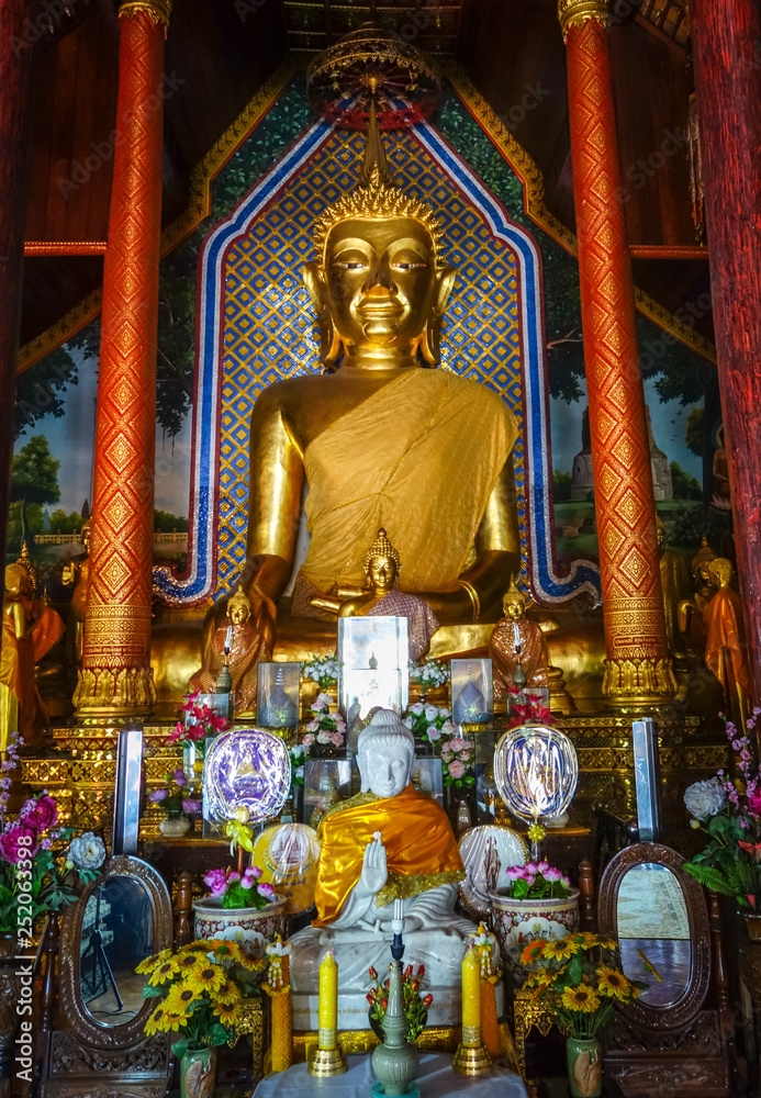 Buddha statue in Wat Chomphu temple, Chiang Mai, Thailand
