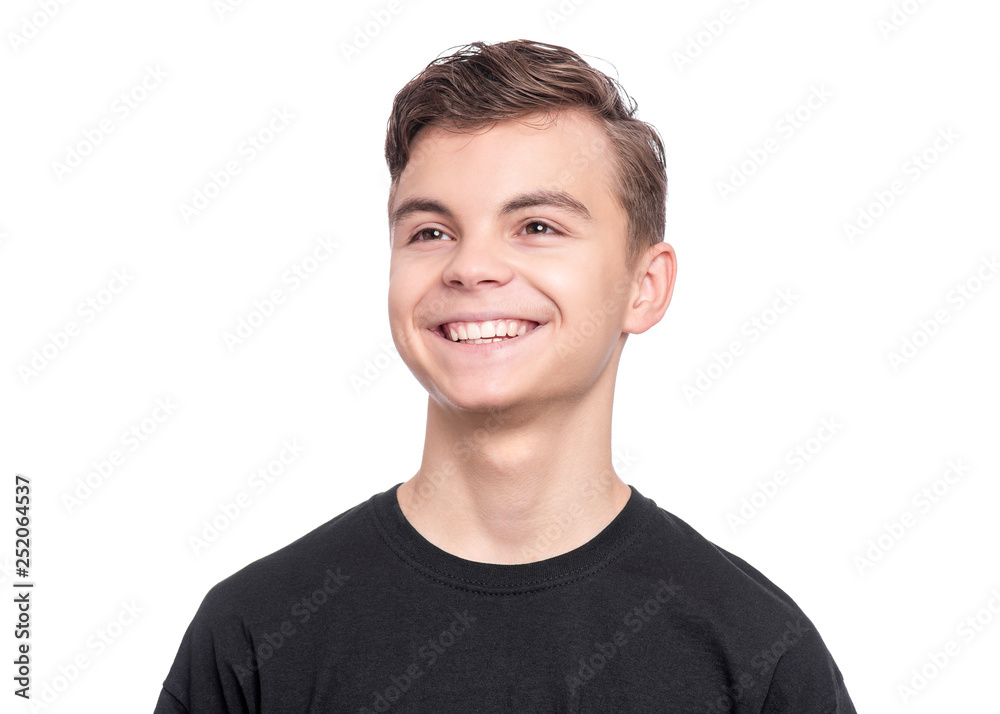 Handsome Teen Boy in black T-Shirt. Portrait of caucasian Smiling Teenager isolated on white background. Happy child looking away. Handsome Teen Boy in black T-Shirt. Portrait of caucasian Smiling Teenager isolated on white background. Happy child looking away.
