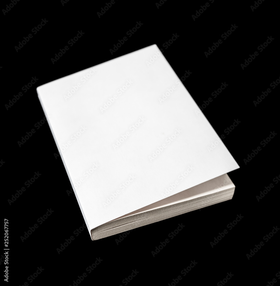 Closed blank book isolated on black Closed blank book isolated on black
