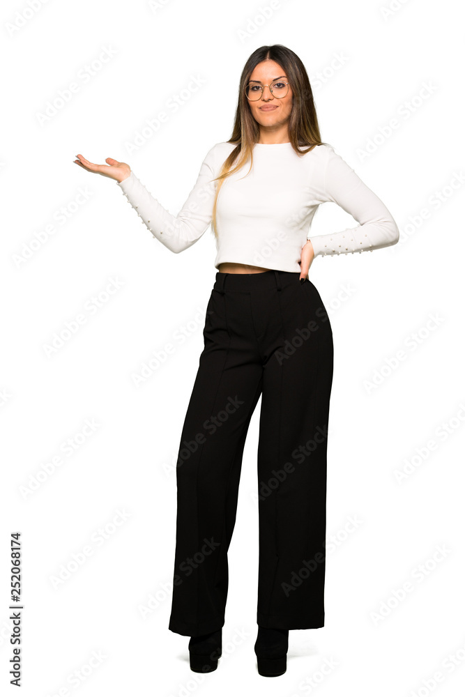 Full body of Pretty woman with glasses holding copyspace imaginary on the palm to insert an ad Full body of Pretty woman with glasses holding copyspace imaginary on the palm to insert an ad