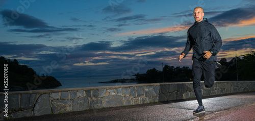 Urban Male Runner in a moon light