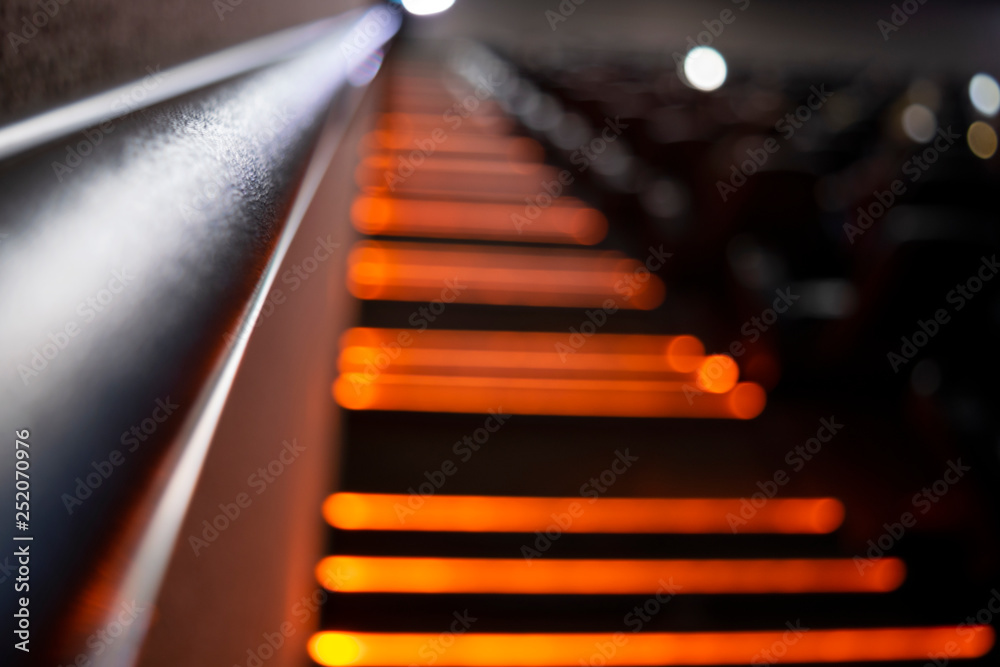 Indoor cinema staircase in latin america, emergency signage, guide light. Indoor cinema staircase in latin america, emergency signage, guide light.