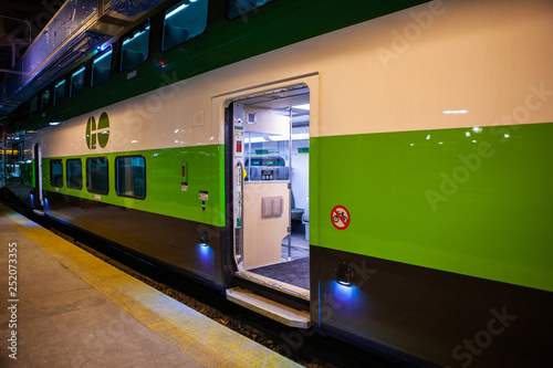 TORONTO CANADA - February 16, 2019: Green wagons of speed Toronto’s GO train at Platform of Union Station